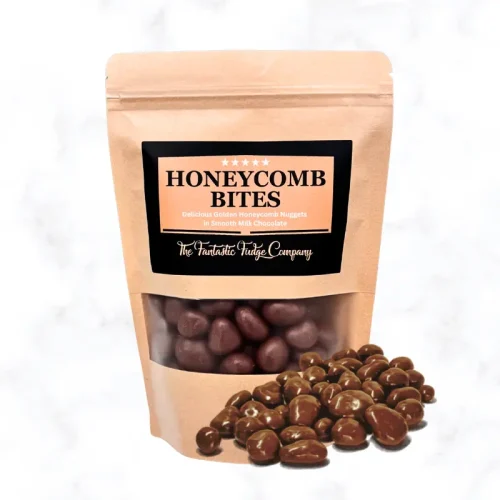 Honeycomb bites shown in a golden/brown pouch with black and gold branding. Displayed next to a small selection of chocolate coated honeycomb bites